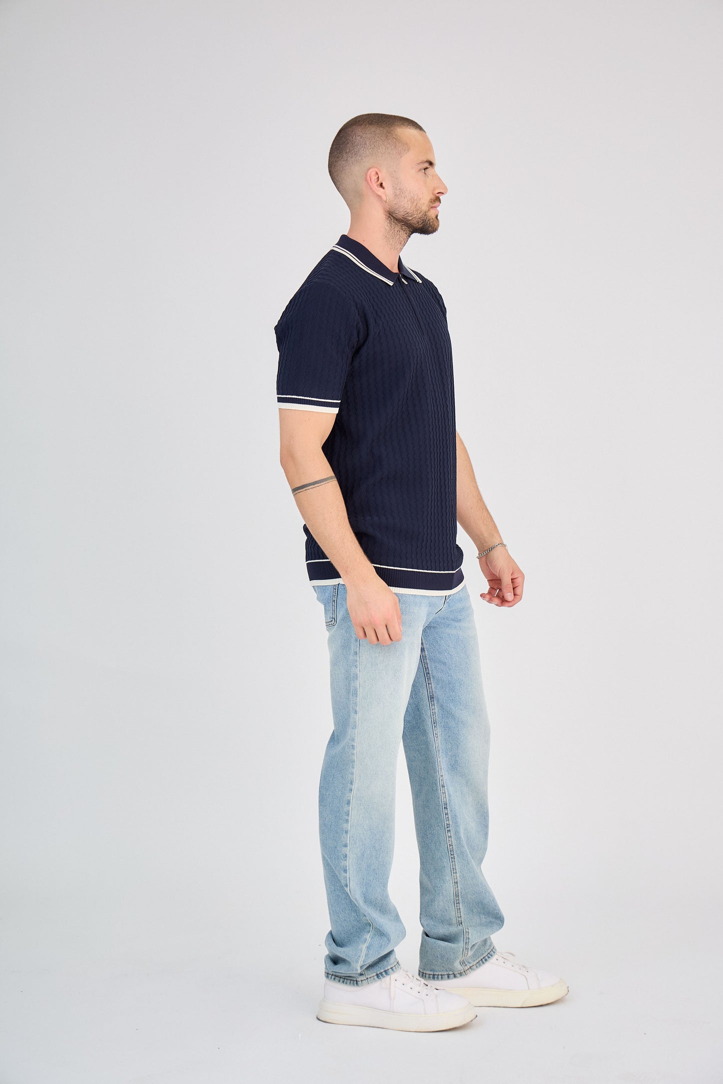 Polo zippé en maille torsadée marine