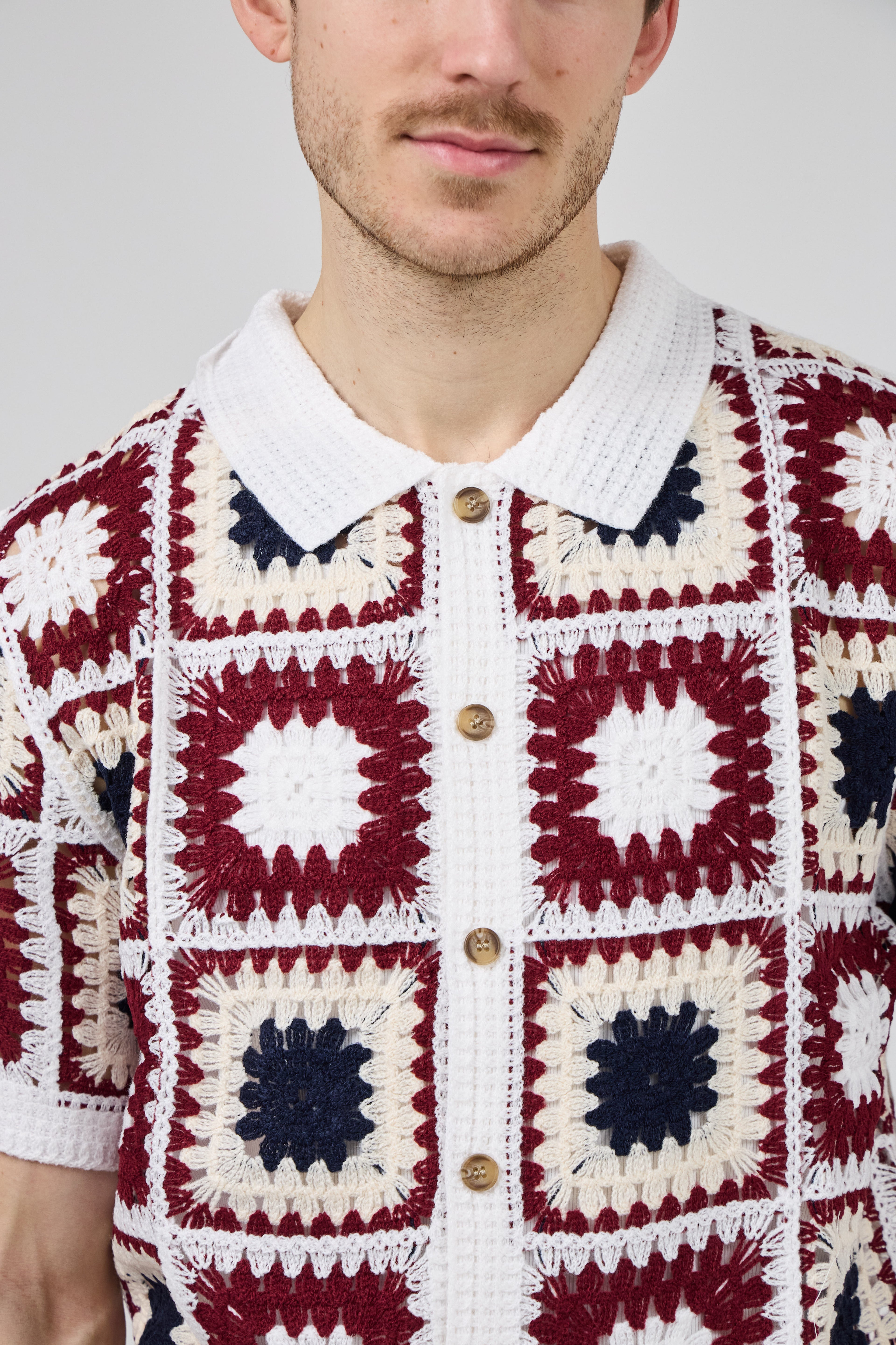 Chemise polo homme en maille crochet à motifs