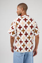 Chemise en crochet à motif floral géométrique