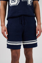 Ensemble homme en maille ajourée avec motif 84