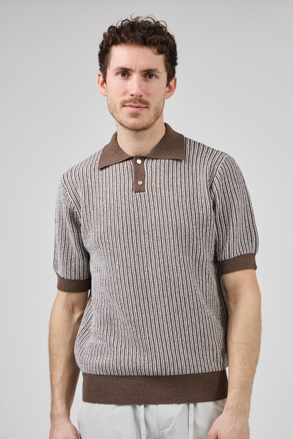 Polo en maille texturée à manches courtes