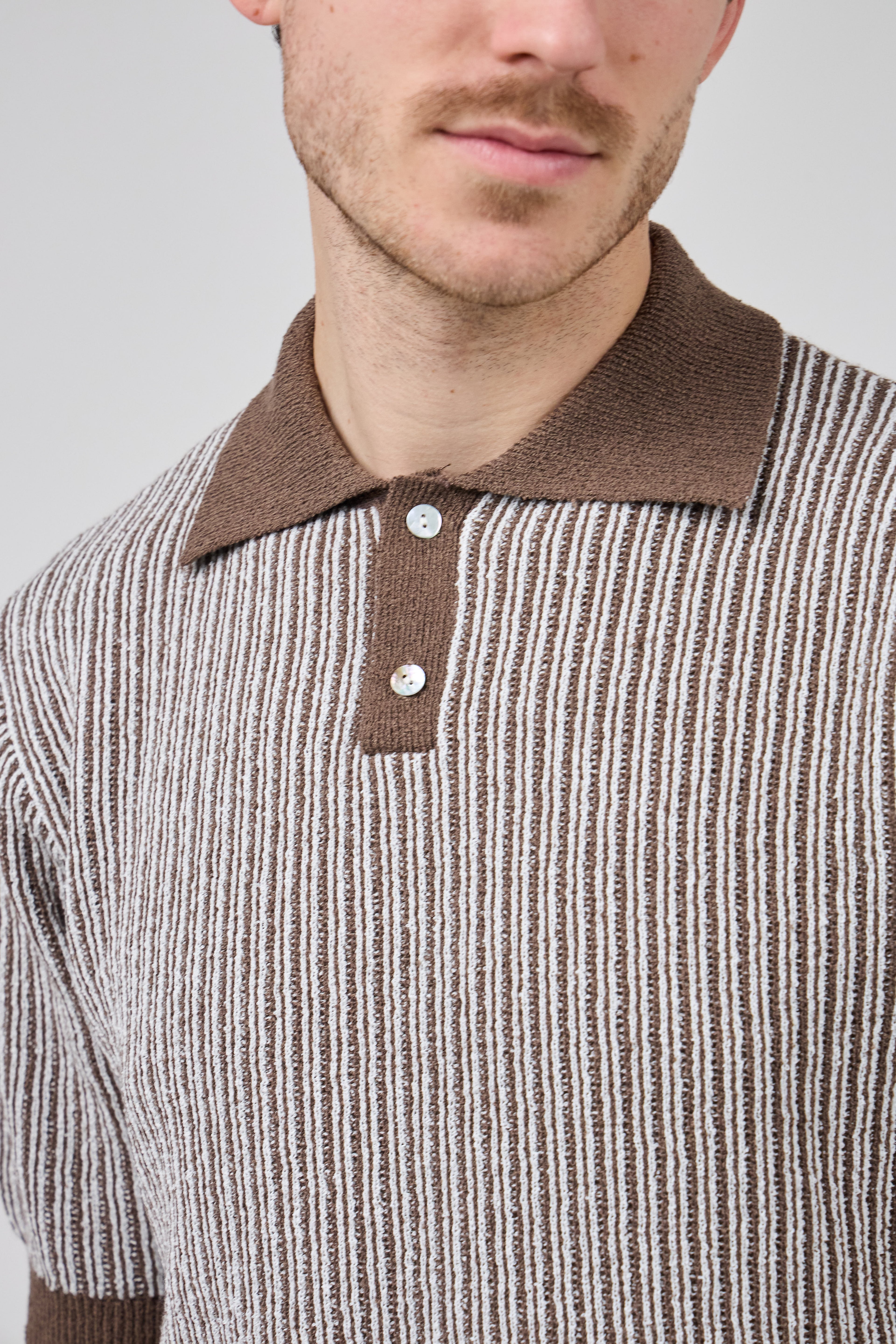 Polo en maille texturée à manches courtes