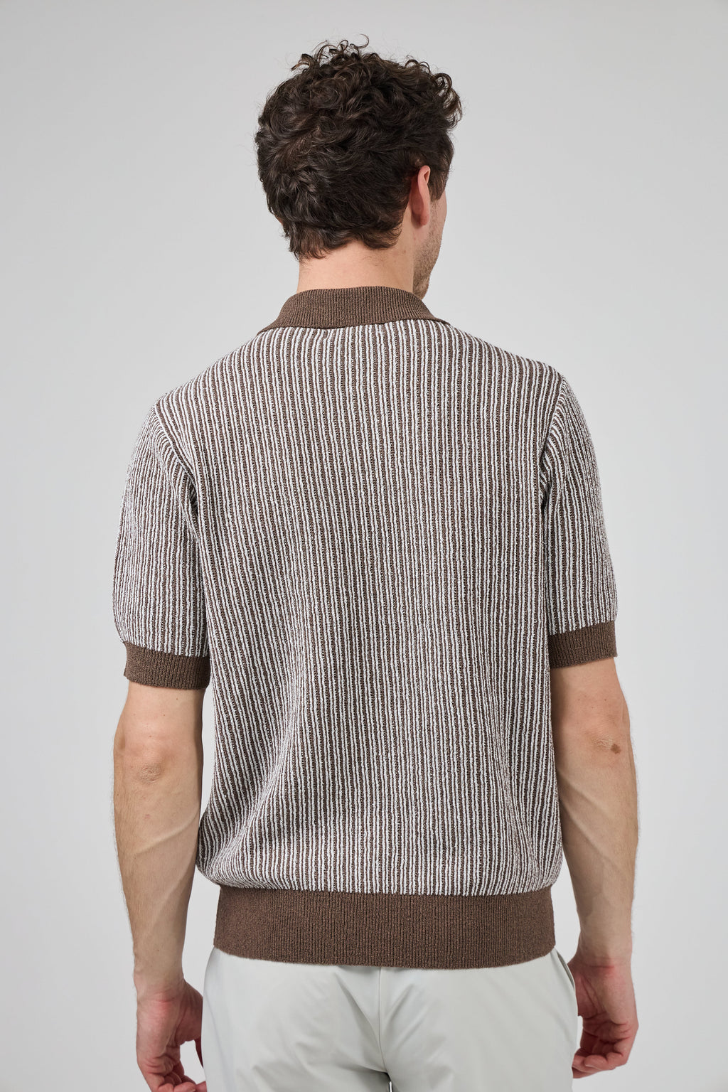 Polo en maille texturée à manches courtes