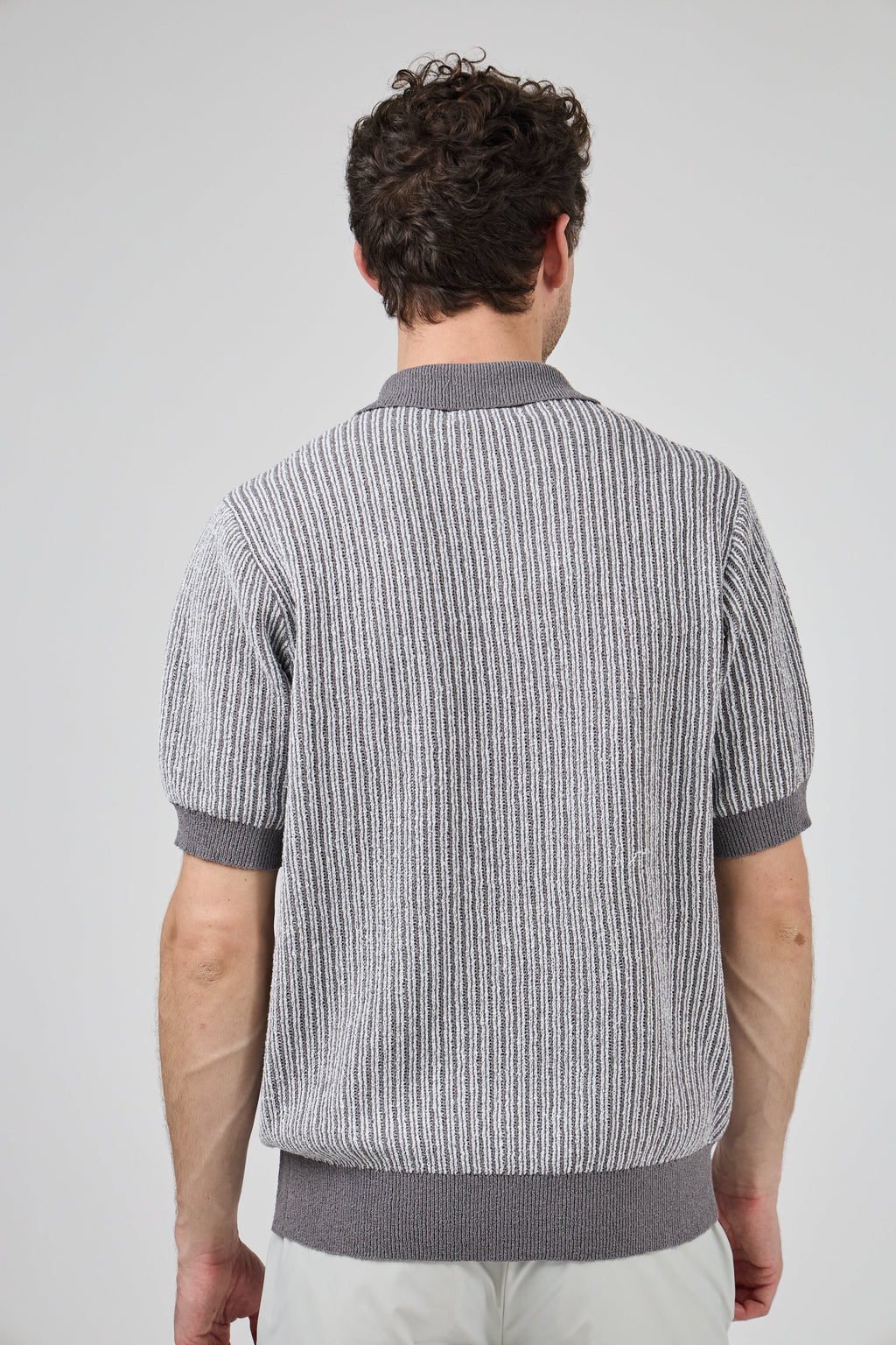 Polo en maille texturée à manches courtes