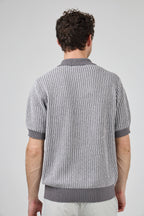 Polo en maille texturée à manches courtes