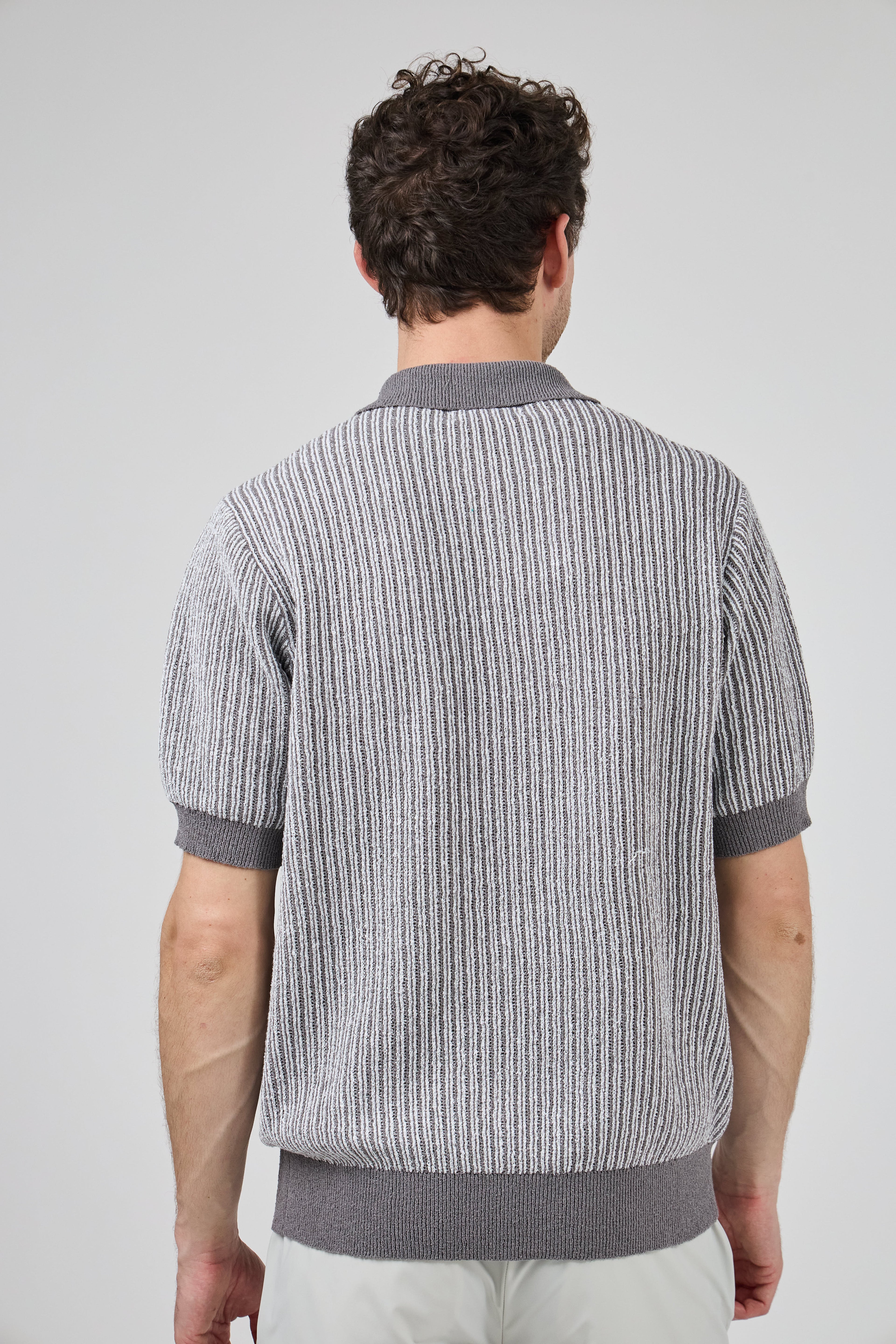 Polo en maille texturée à manches courtes
