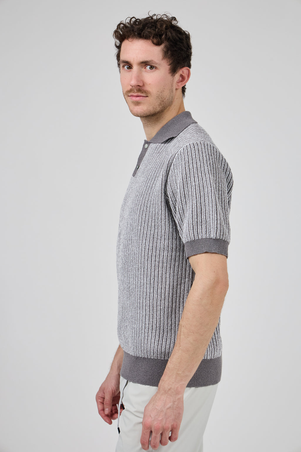 Polo en maille texturée à manches courtes