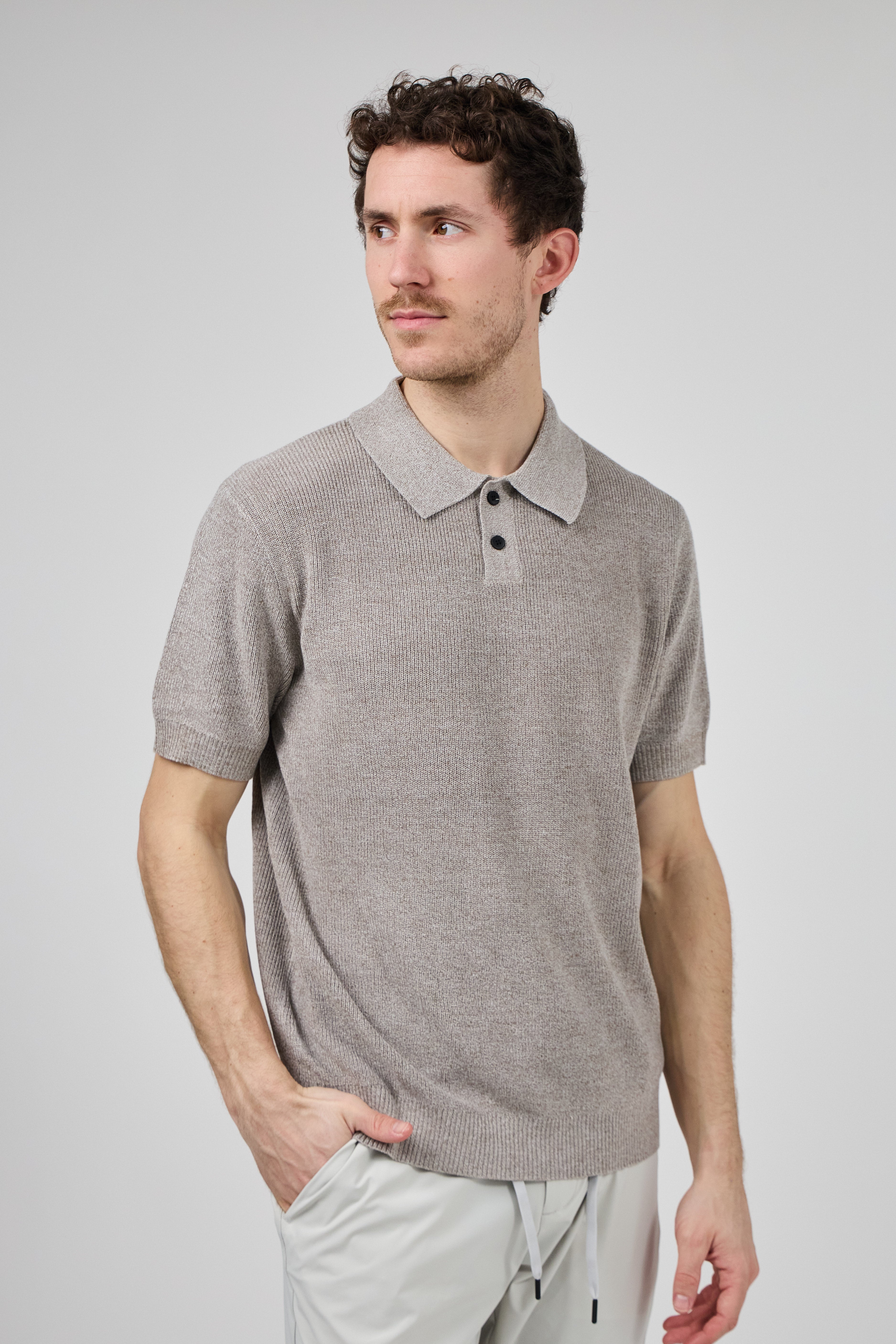 Polo en maille texturée à manches courtes