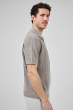 Polo en maille texturée à manches courtes