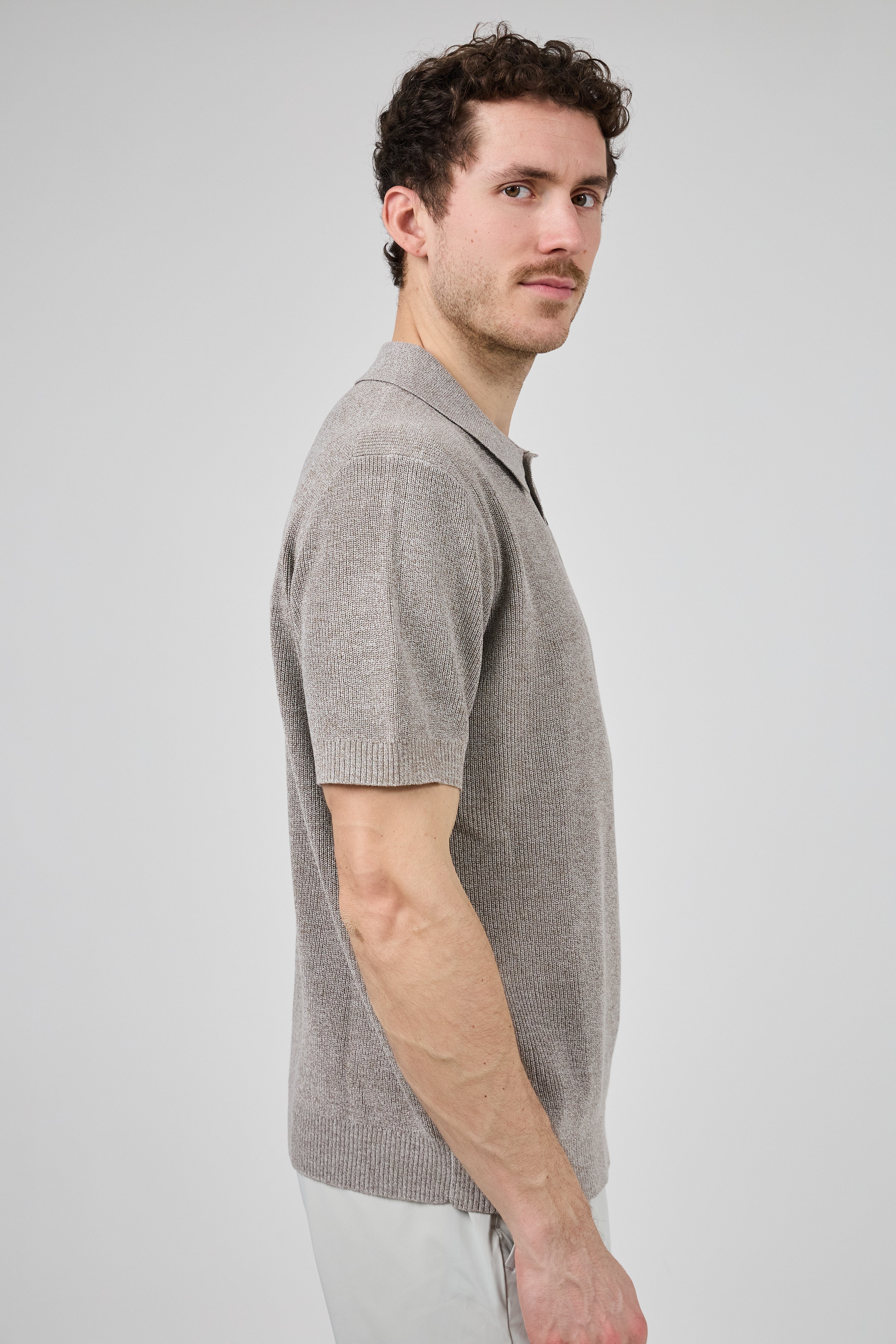 Polo en maille texturée à manches courtes
