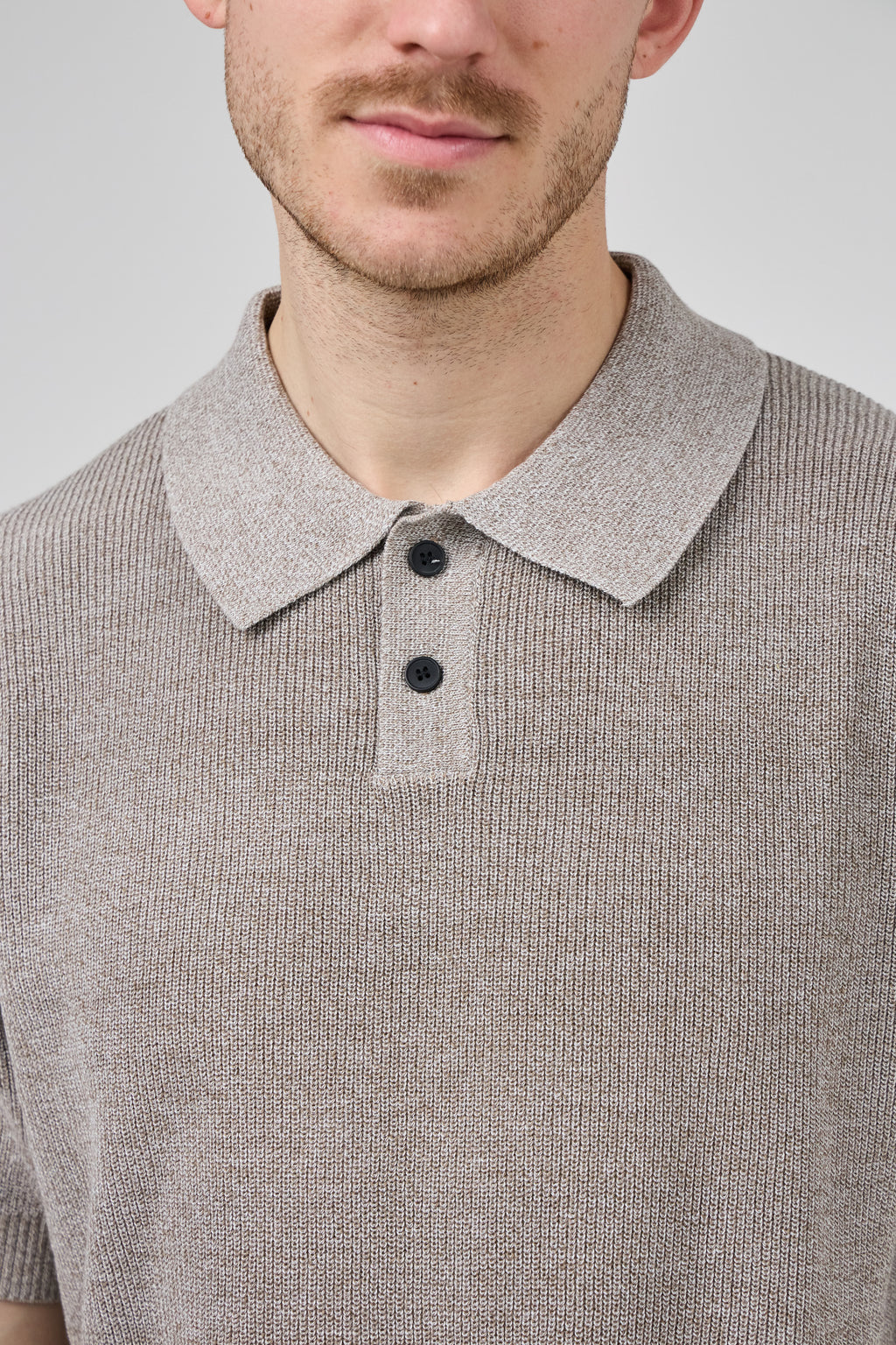 Polo en maille texturée à manches courtes