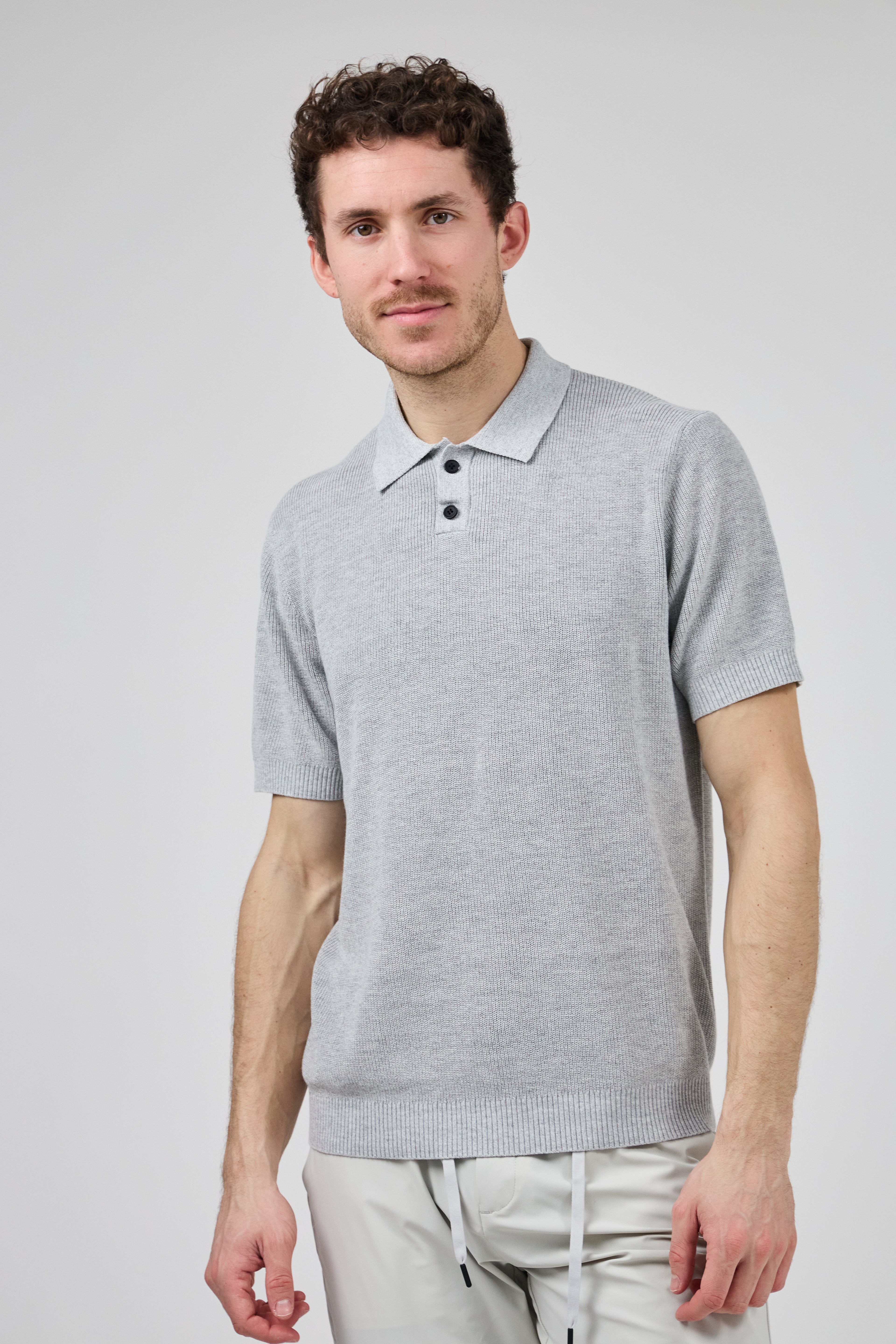 Polo en maille texturée à manches courtes