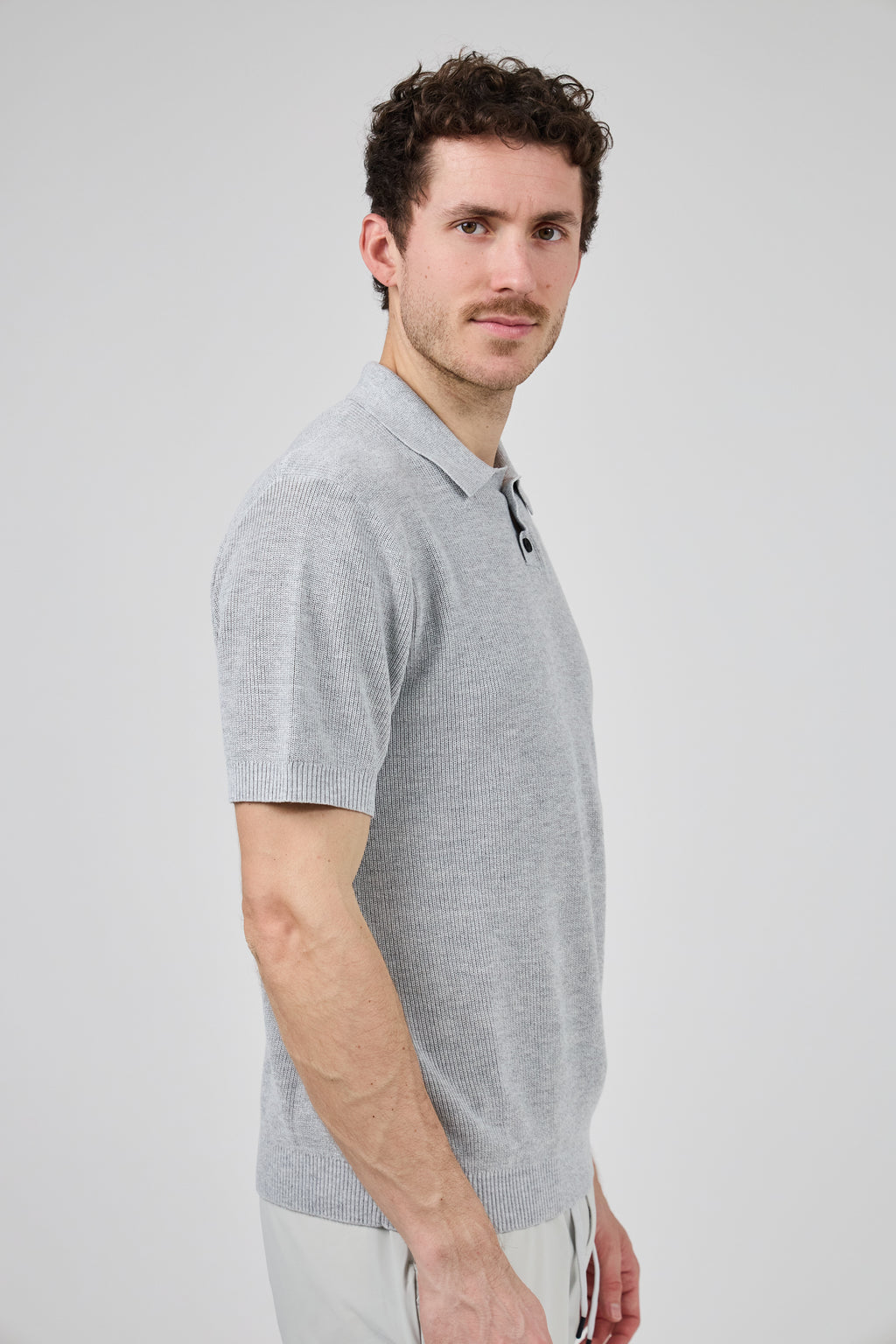 Polo en maille texturée à manches courtes