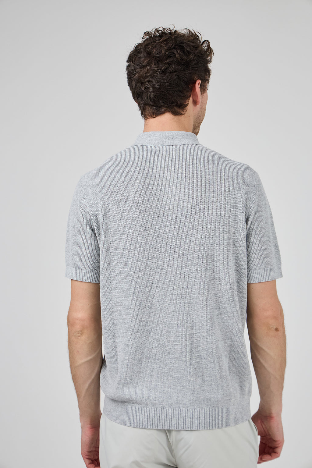 Polo en maille texturée à manches courtes