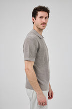 Polo en maille texturée à demi-zip pour homme
