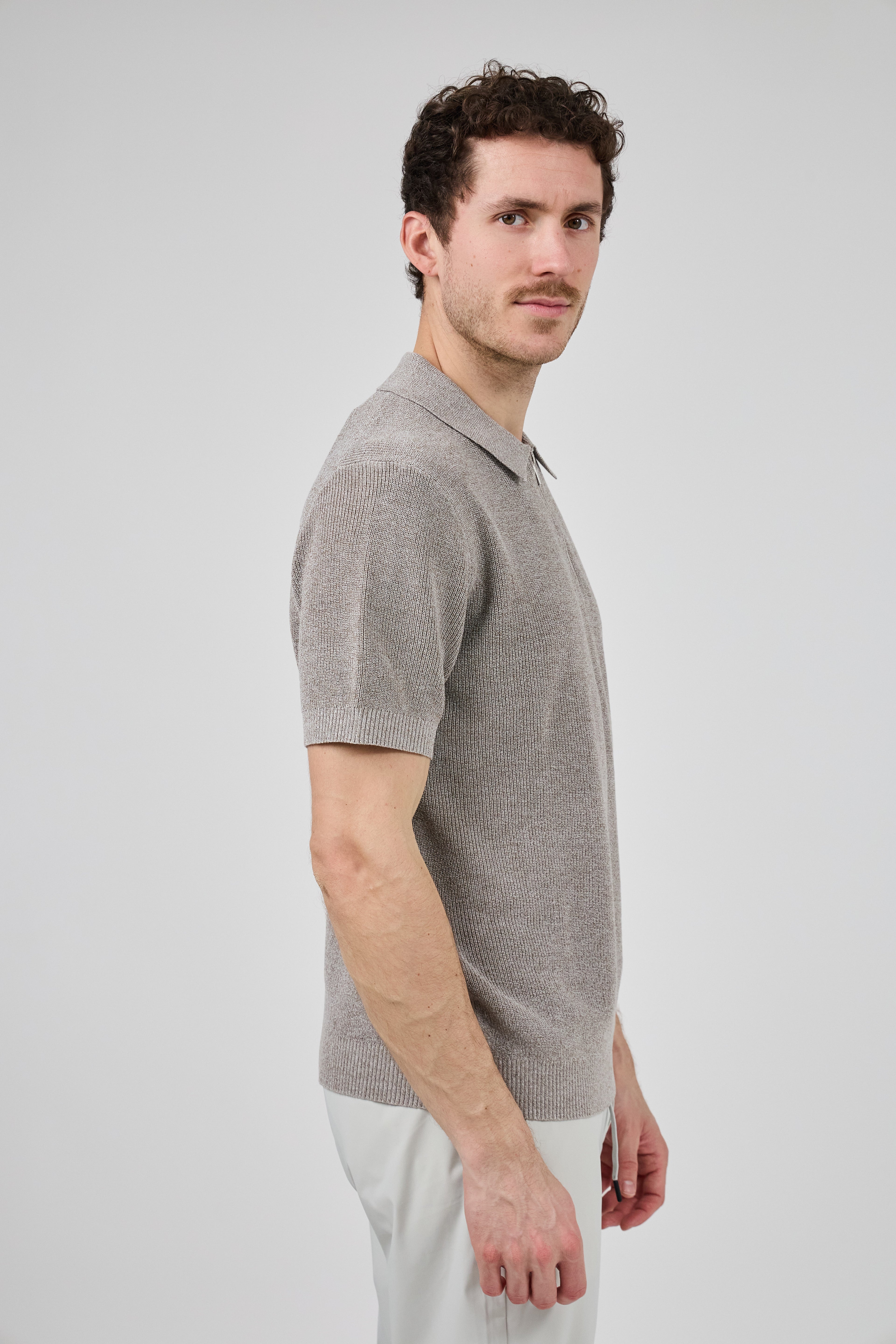 Polo en maille texturée à demi-zip pour homme
