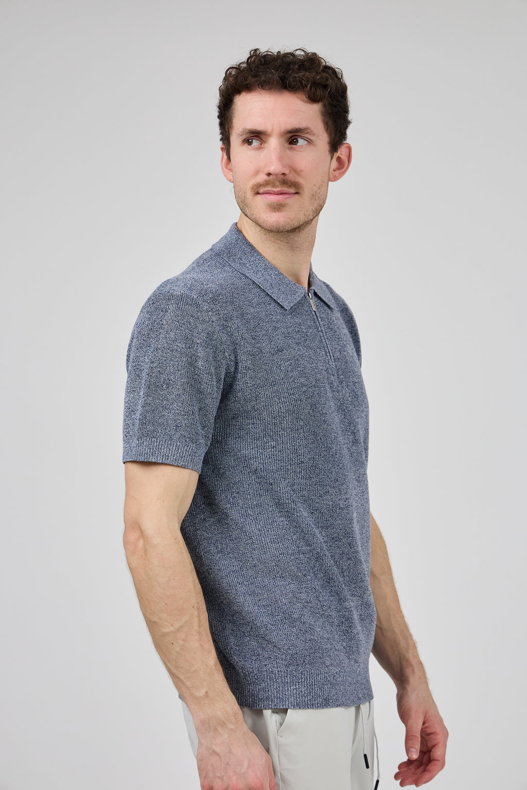Polo en maille texturée à demi-zip pour homme