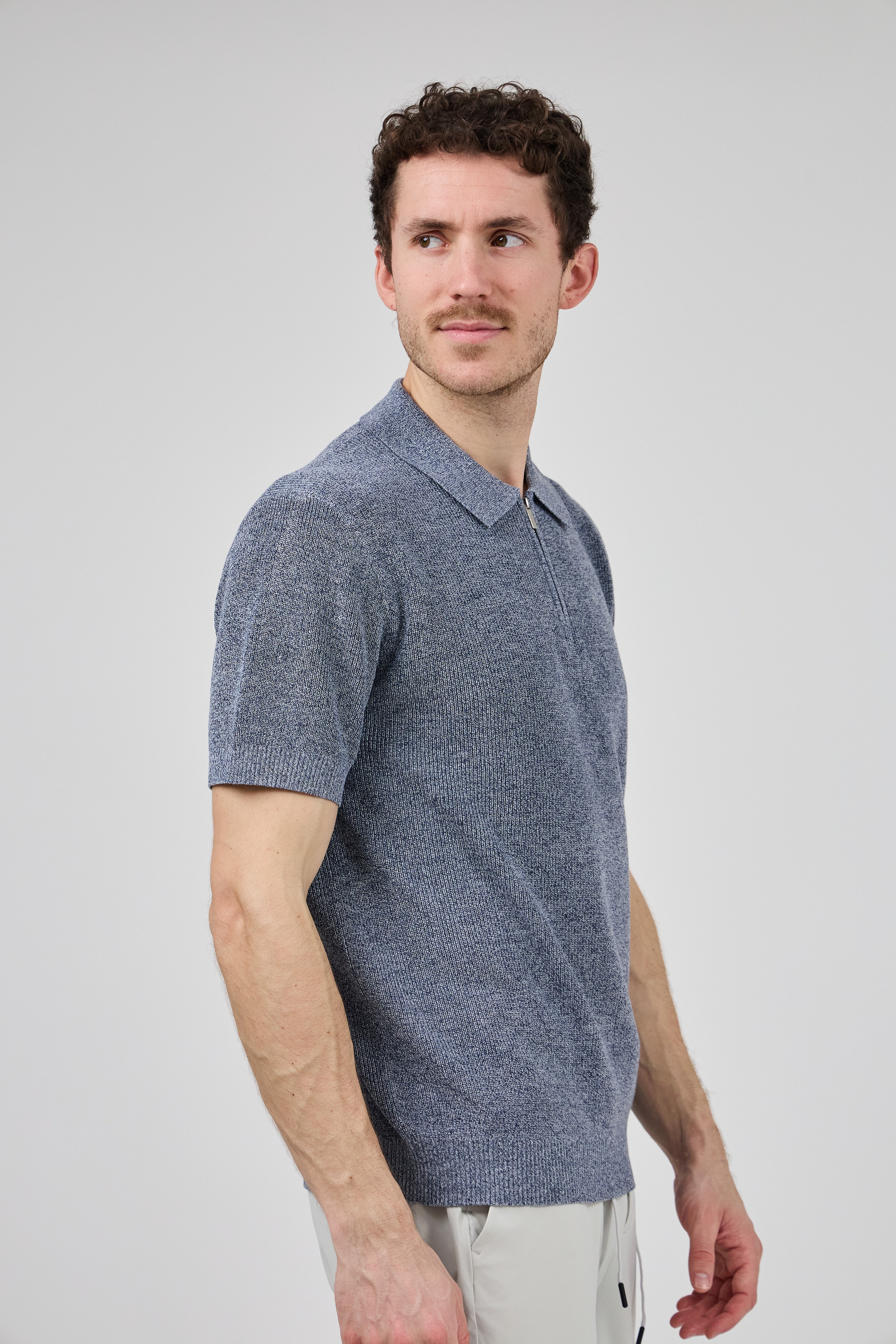 Polo en maille texturée à demi-zip pour homme
