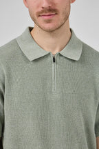 Polo en maille texturée à demi-zip pour homme