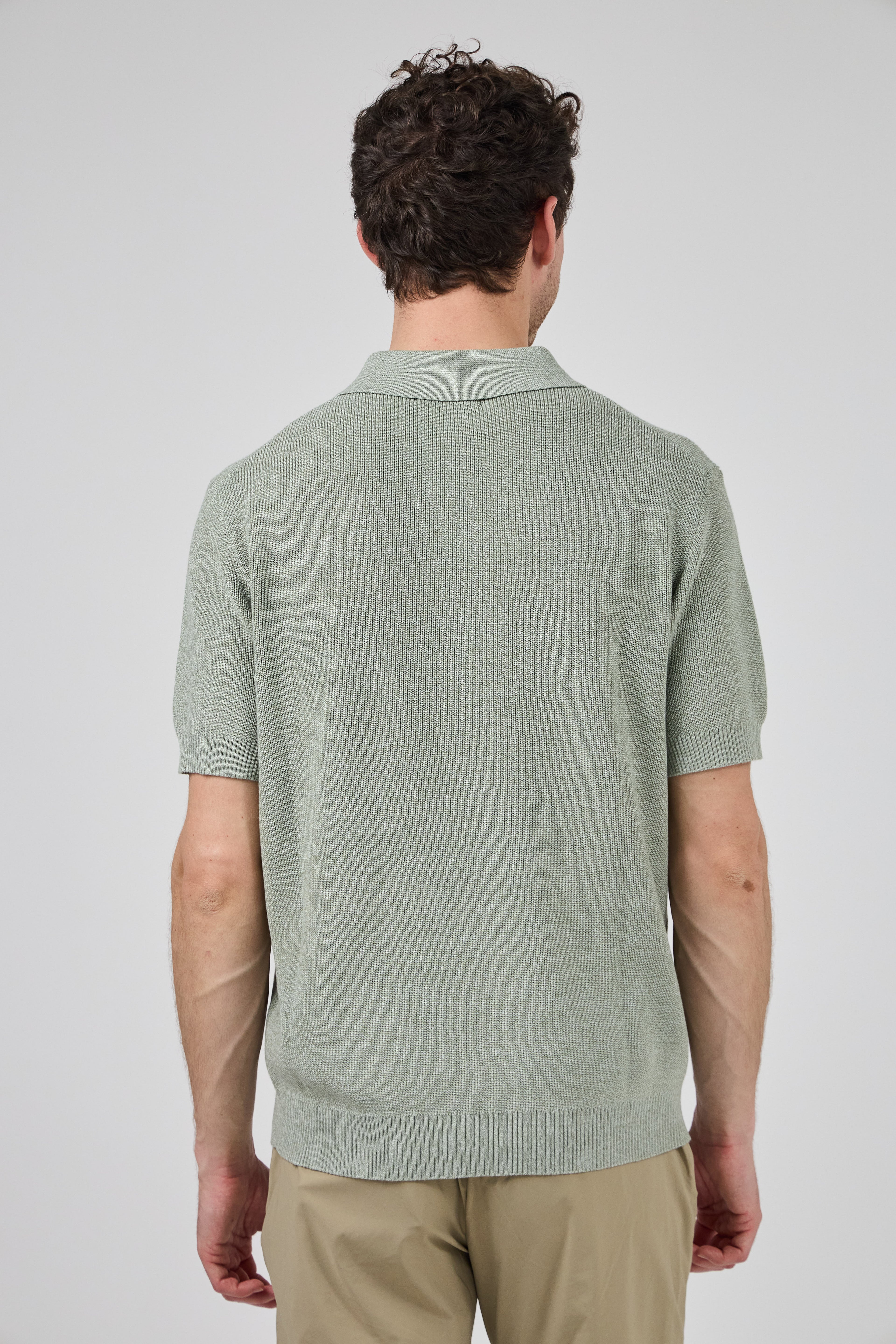 Polo en maille texturée à demi-zip pour homme