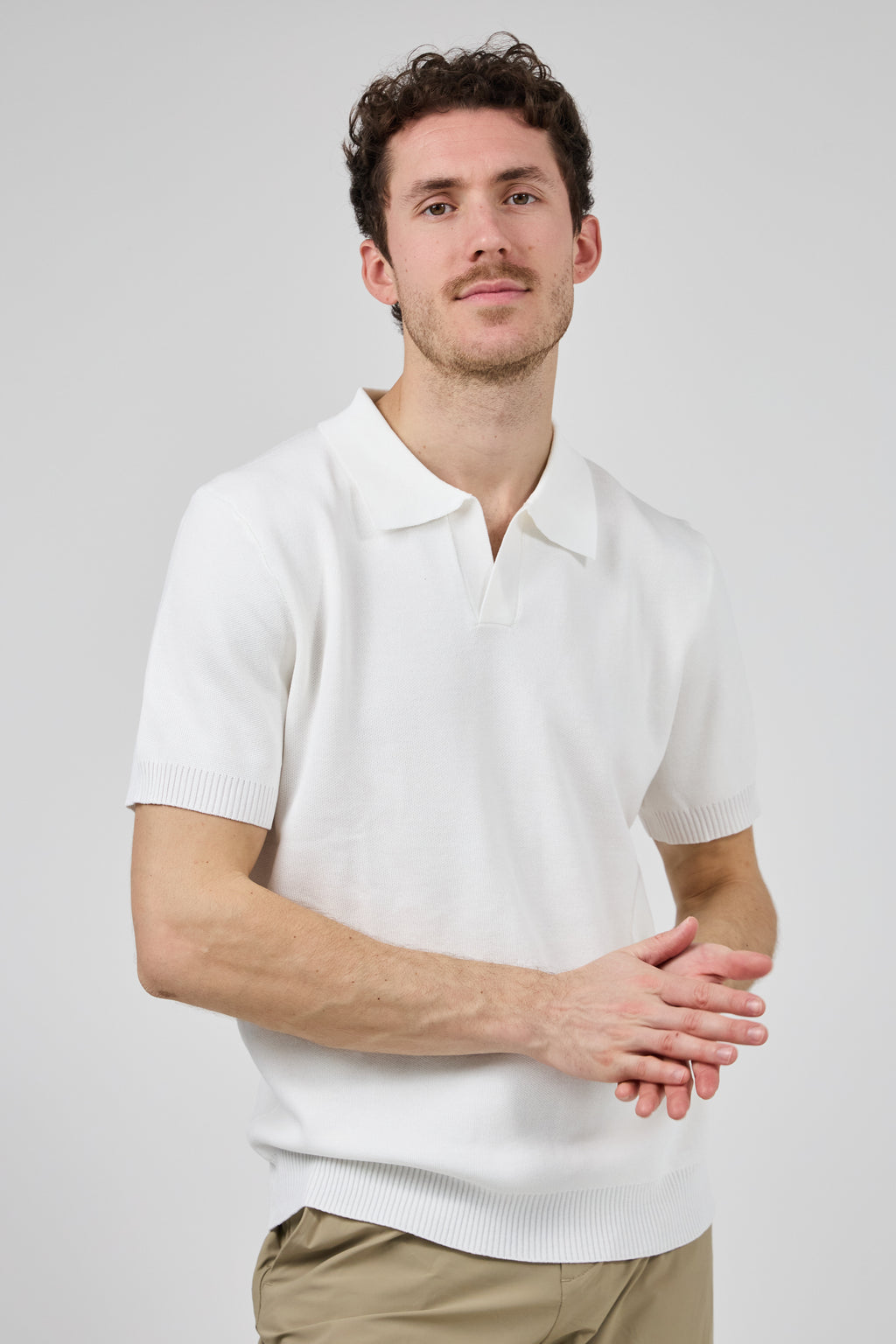 Polo tricoté à manches courtes