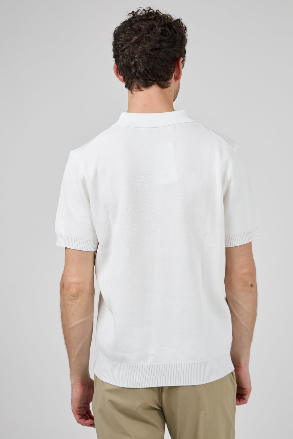Polo tricoté à manches courtes
