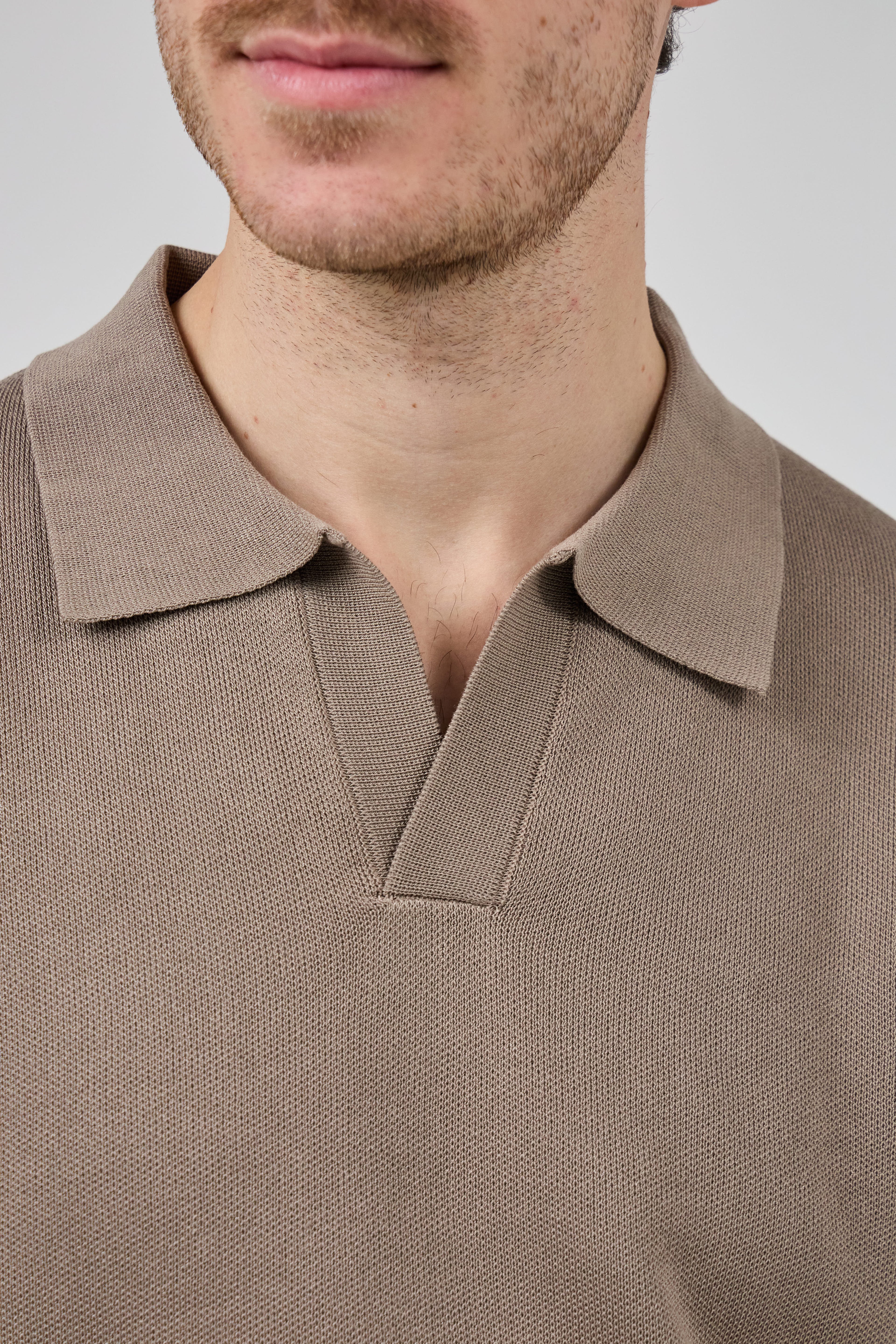 Polo tricoté à manches courtes