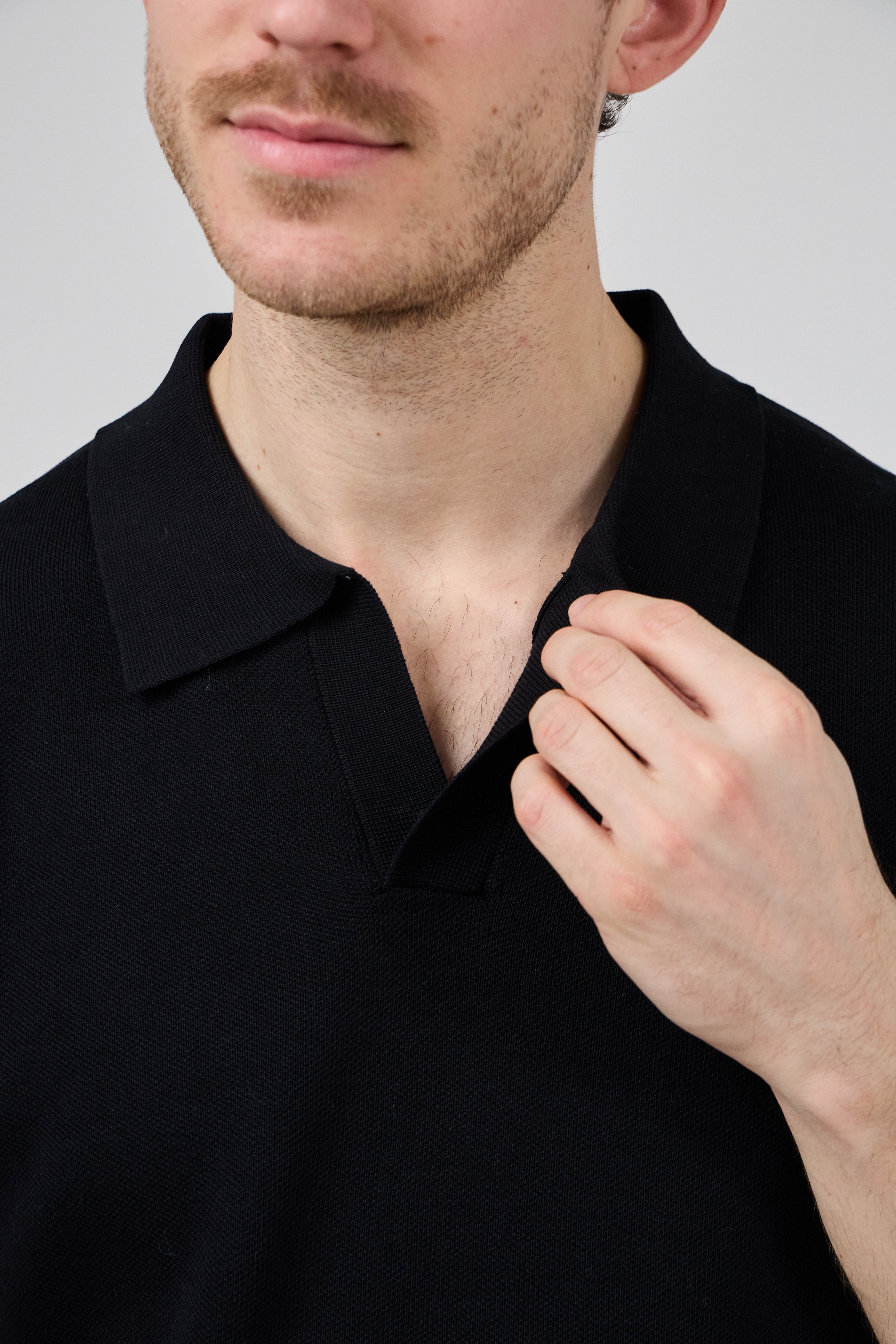 Polo tricoté à manches courtes
