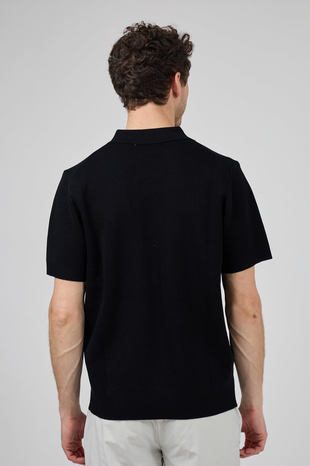 Polo tricoté à manches courtes