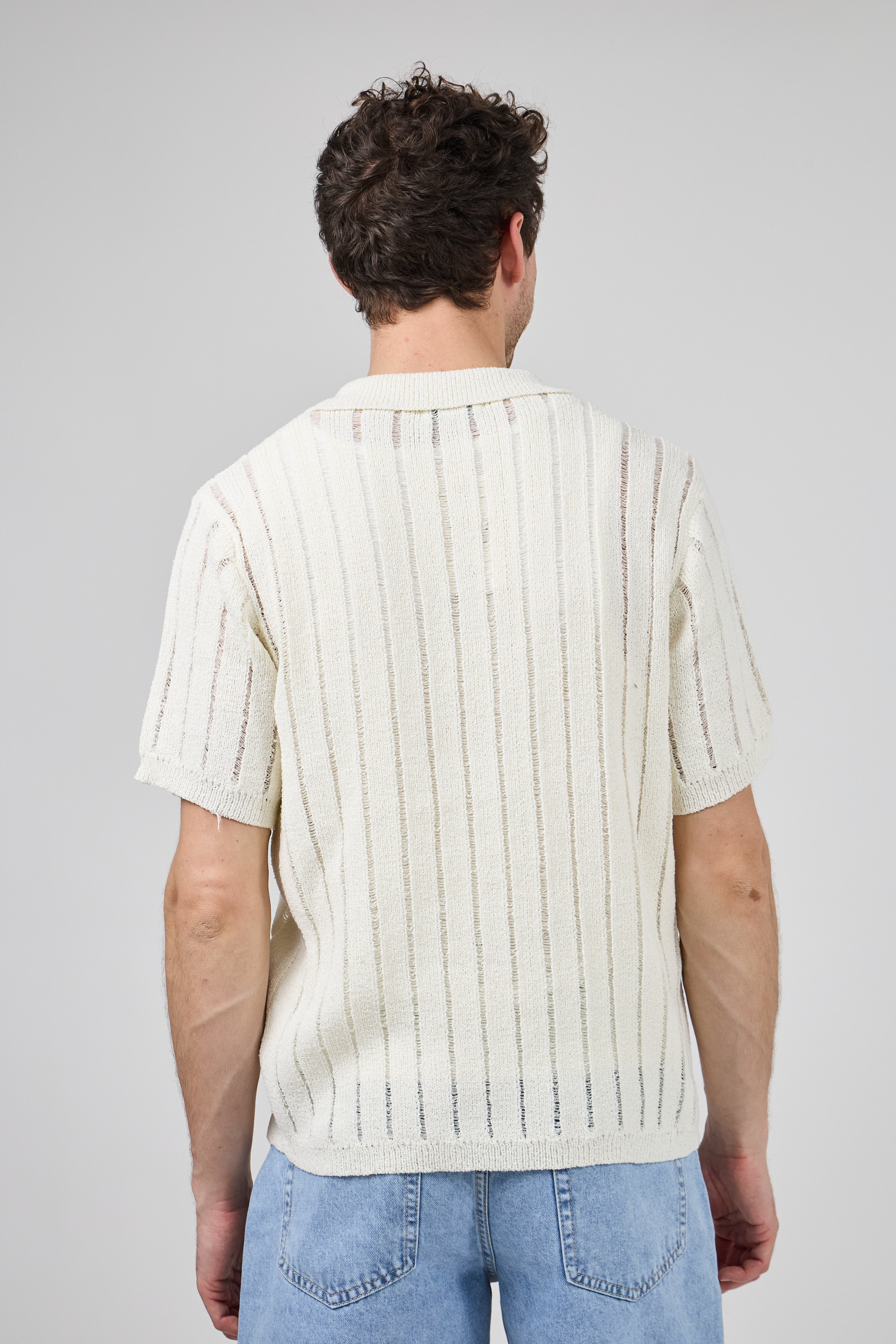 Polo en maille ajourée à manches courtes