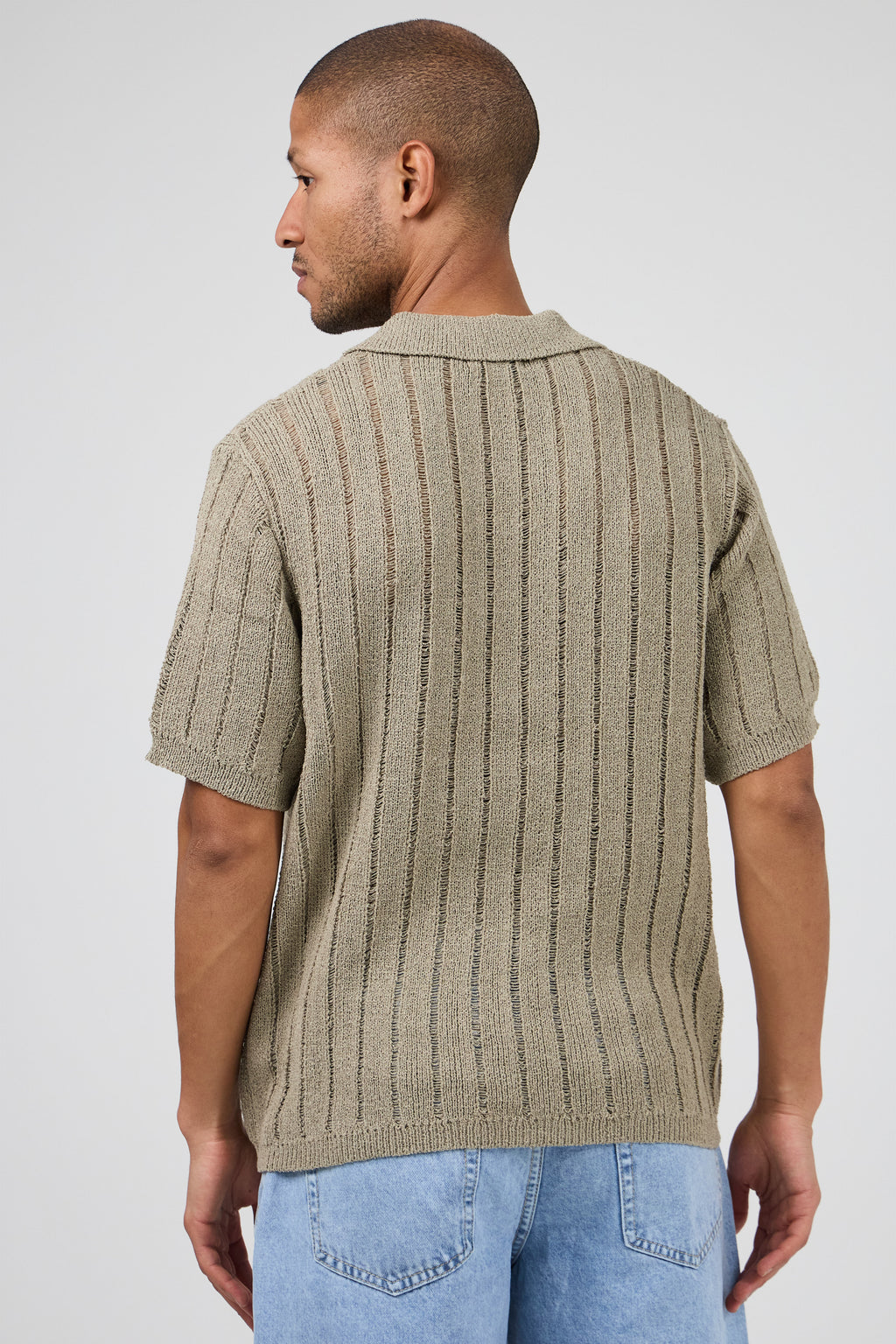 Polo en maille ajourée à manches courtes