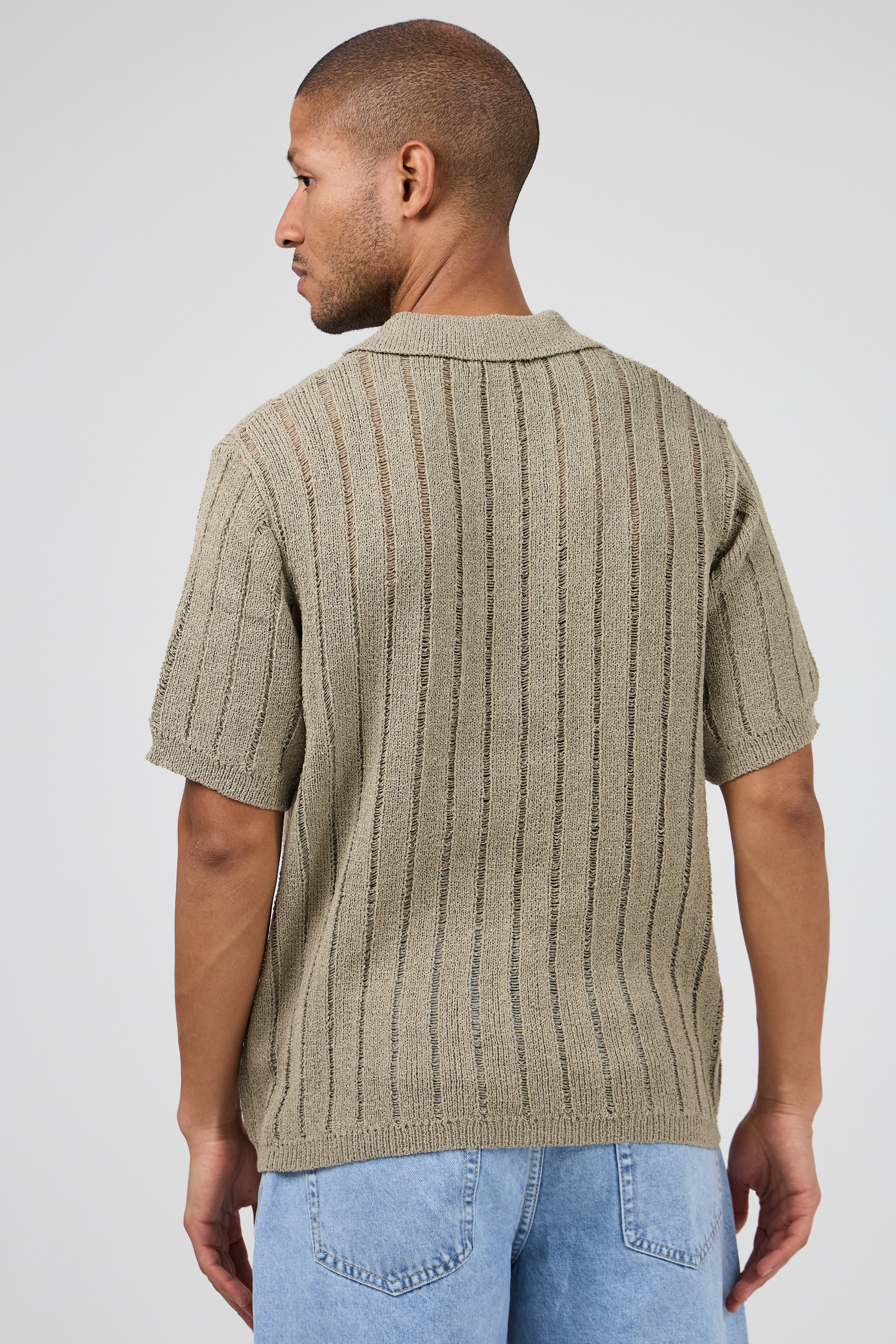 Polo en maille ajourée à manches courtes