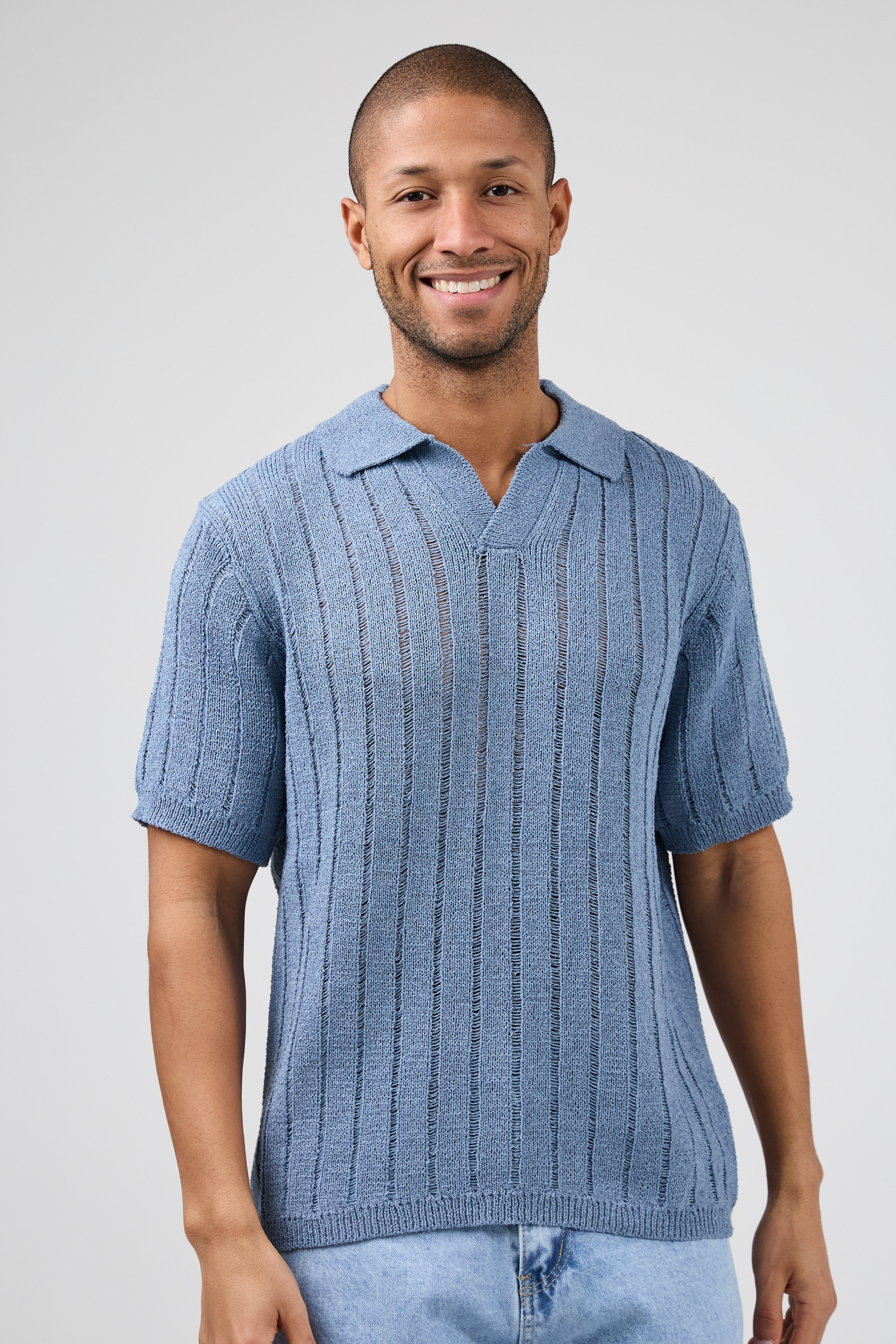 Polo en maille ajourée à manches courtes