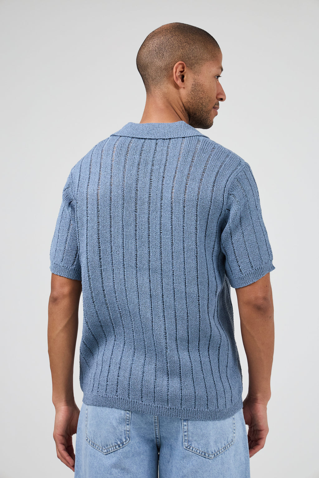 Polo en maille ajourée à manches courtes