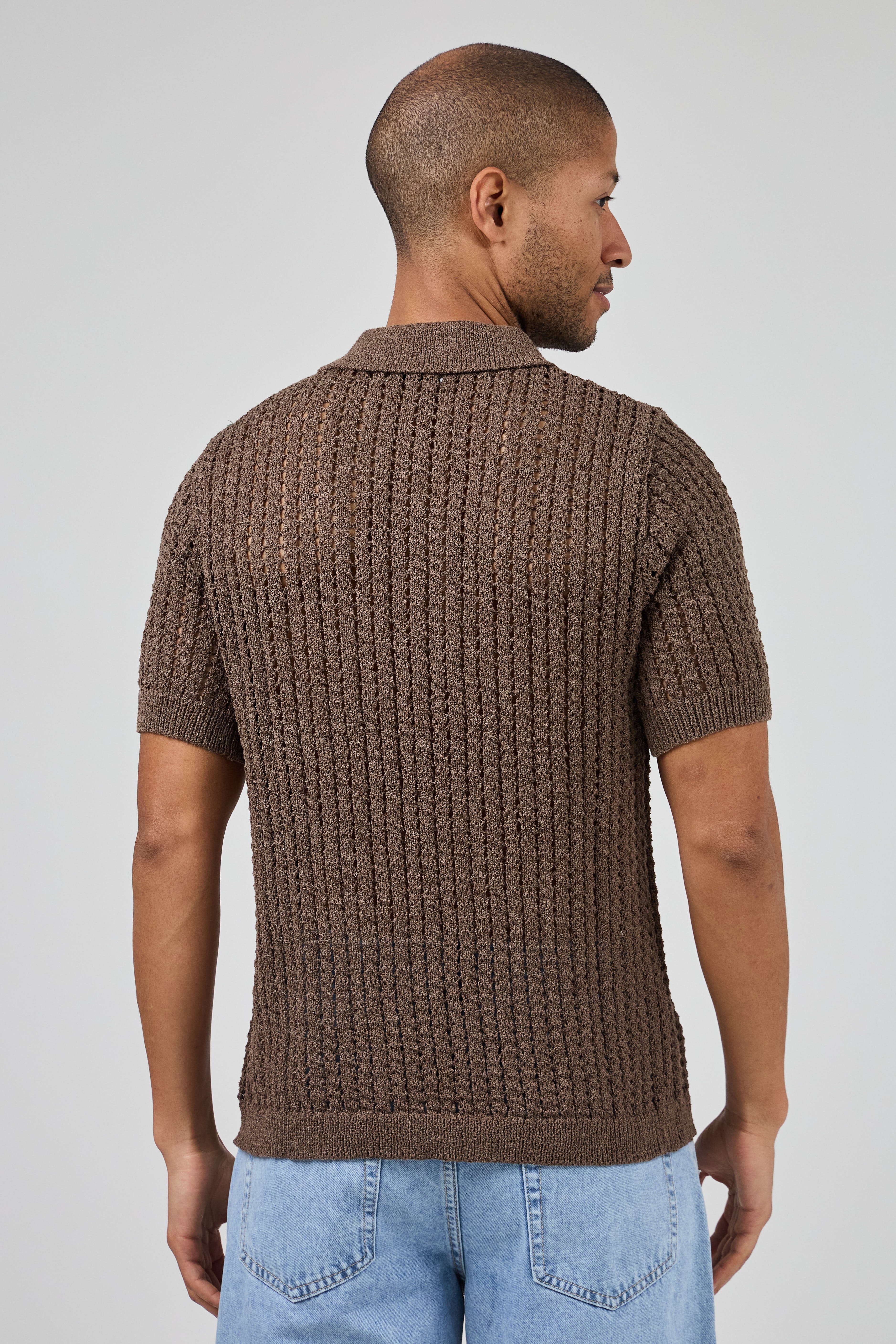 Polo en maille ajourée texturée