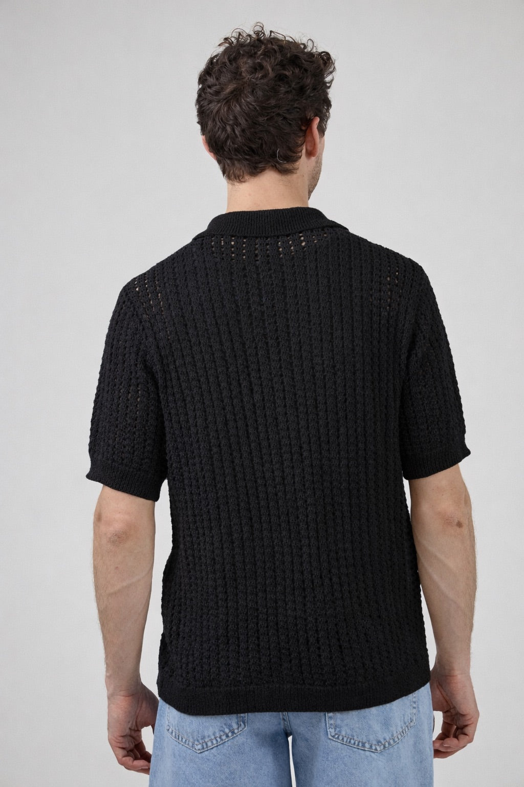 Polo en maille ajourée texturée