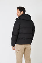 Men's light-colored quilted down jacket with hood