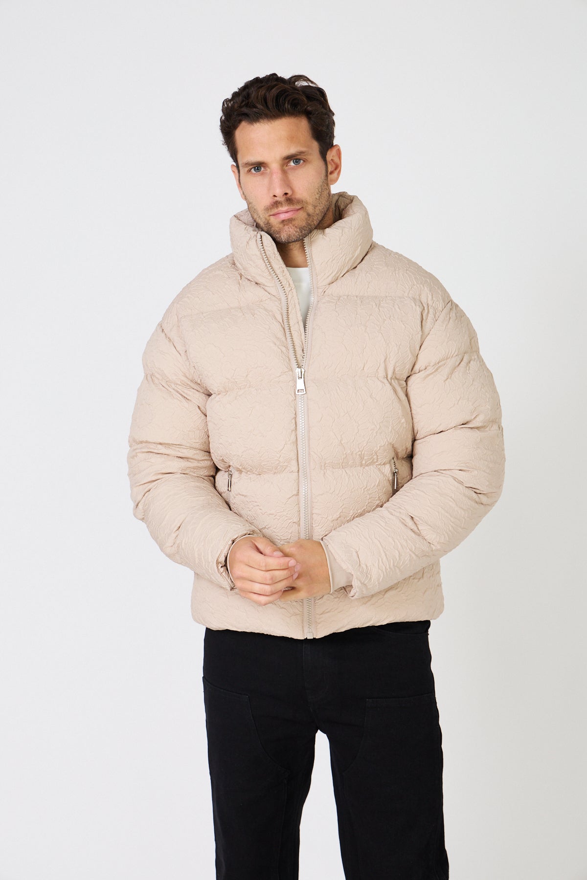 Men's quilted down jacket with relief