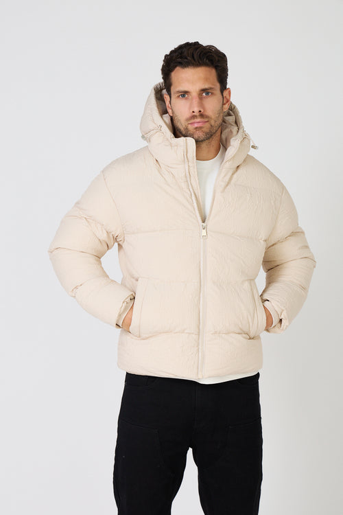 Men's light-colored quilted down jacket with hood
