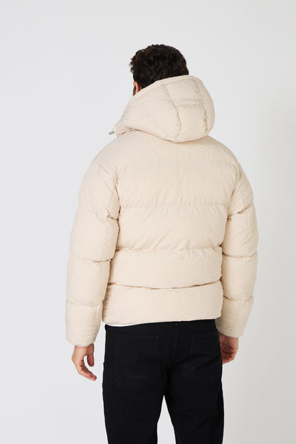Men's light-colored quilted down jacket with hood