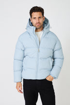 Men's light-colored quilted down jacket with hood