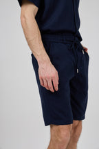 Short homme à taille élastique en lin avec cordon de serrage