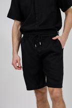 Short homme à taille élastique en lin avec cordon de serrage