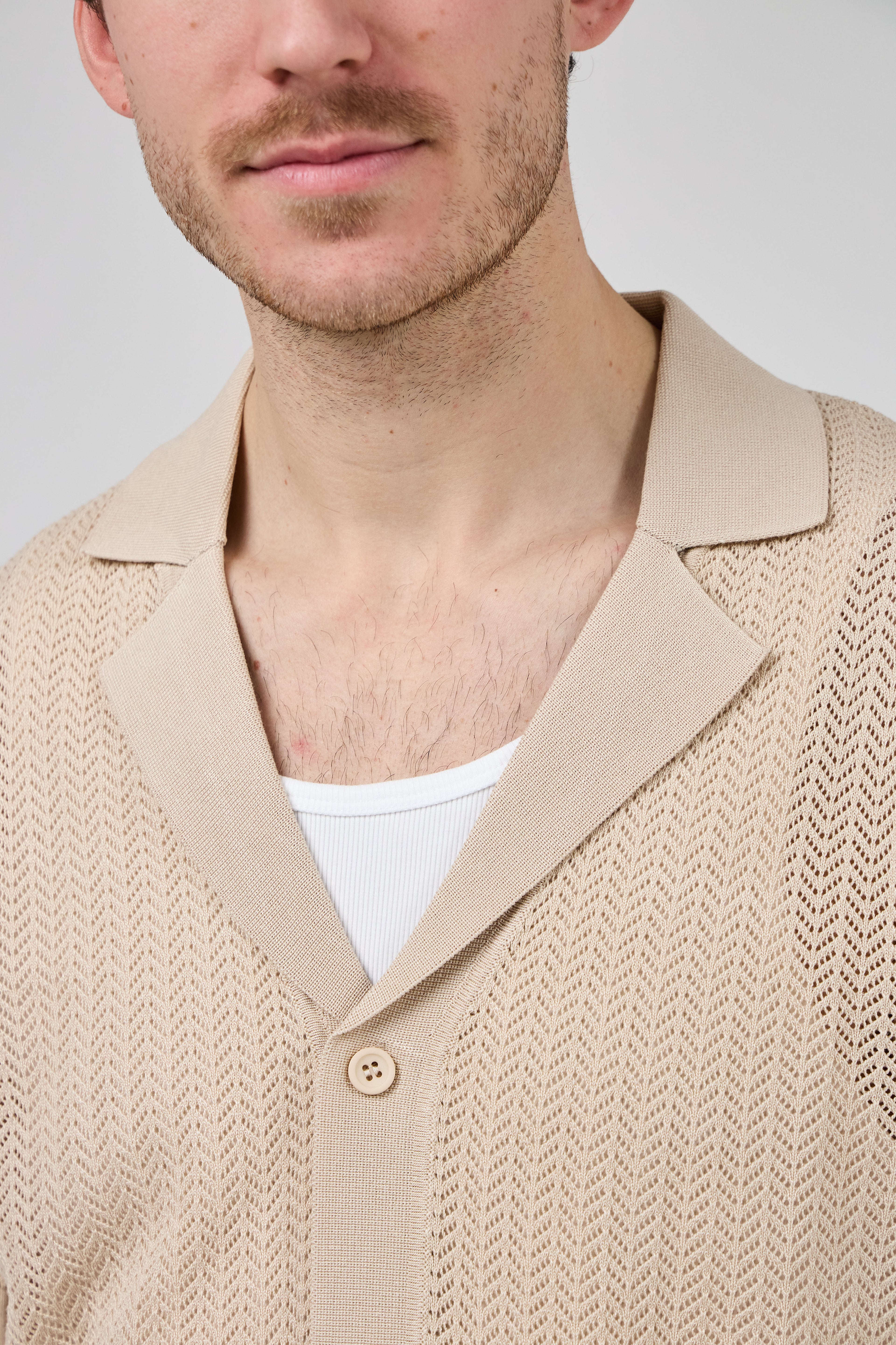 Chemise en maille à manches courtes avec fermeture boutonnée
