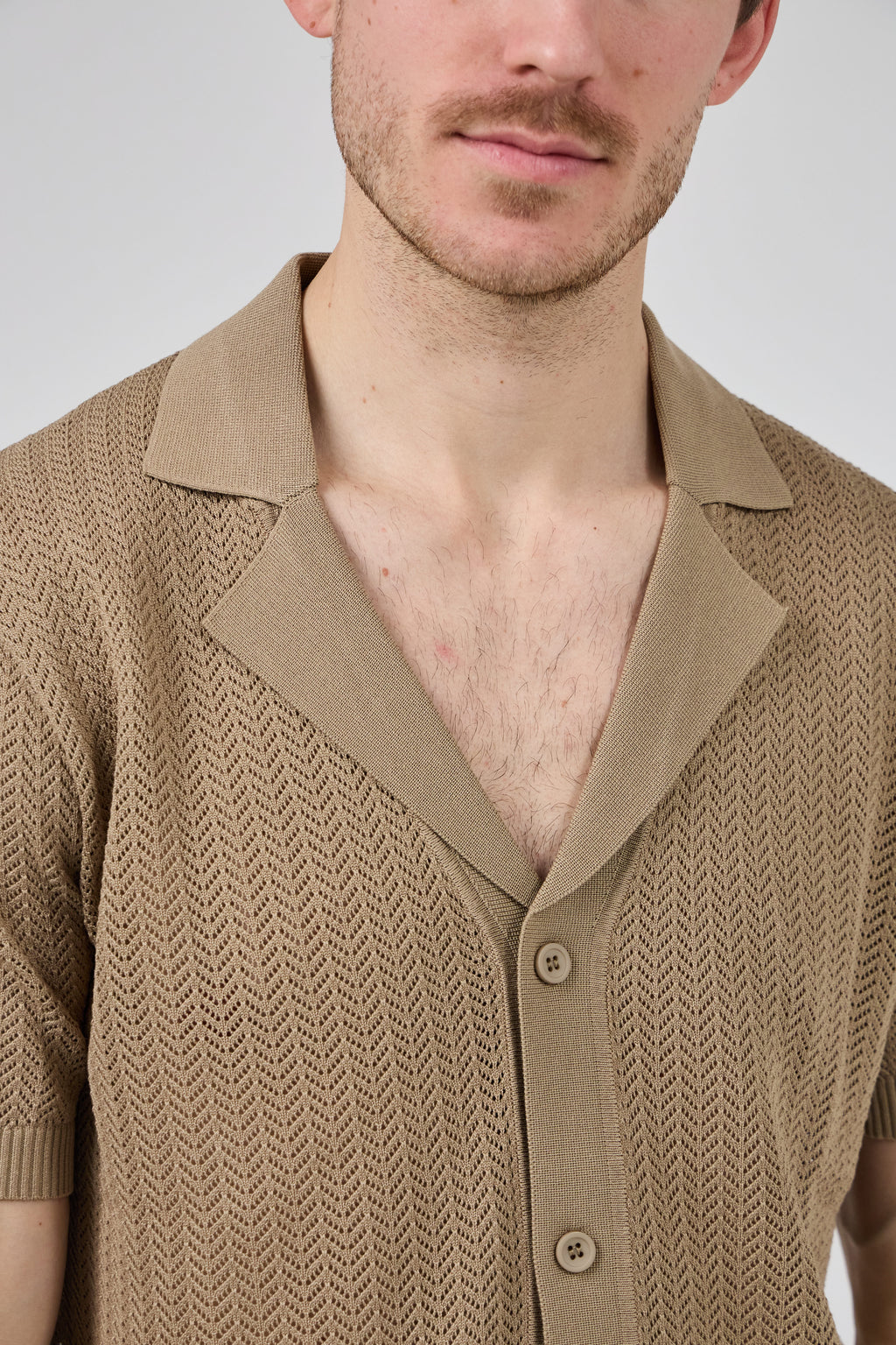 Chemise en maille à manches courtes avec fermeture boutonnée