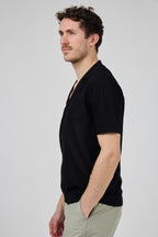 Chemise en maille à manches courtes avec fermeture boutonnée
