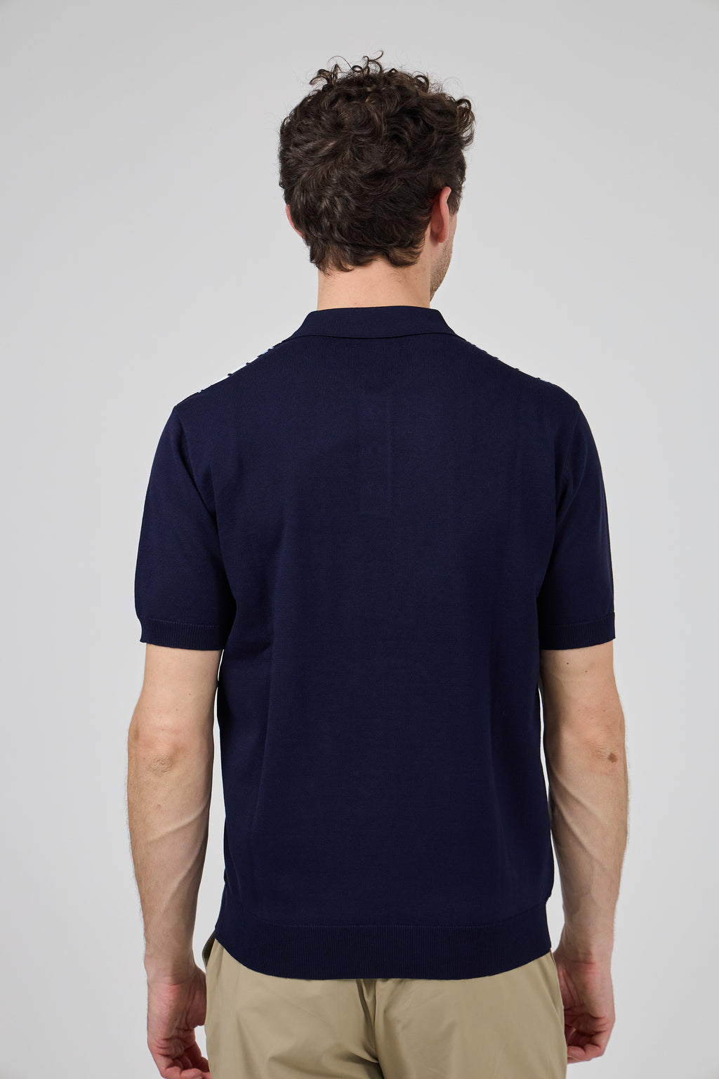 Polo homme à motif vertical structuré