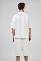 Ensemble avec Haut Ample et Short Large