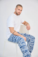 Faded Blue Jeans with Fringes and Seams
