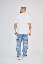 Faded Blue Jeans with Fringes and Seams